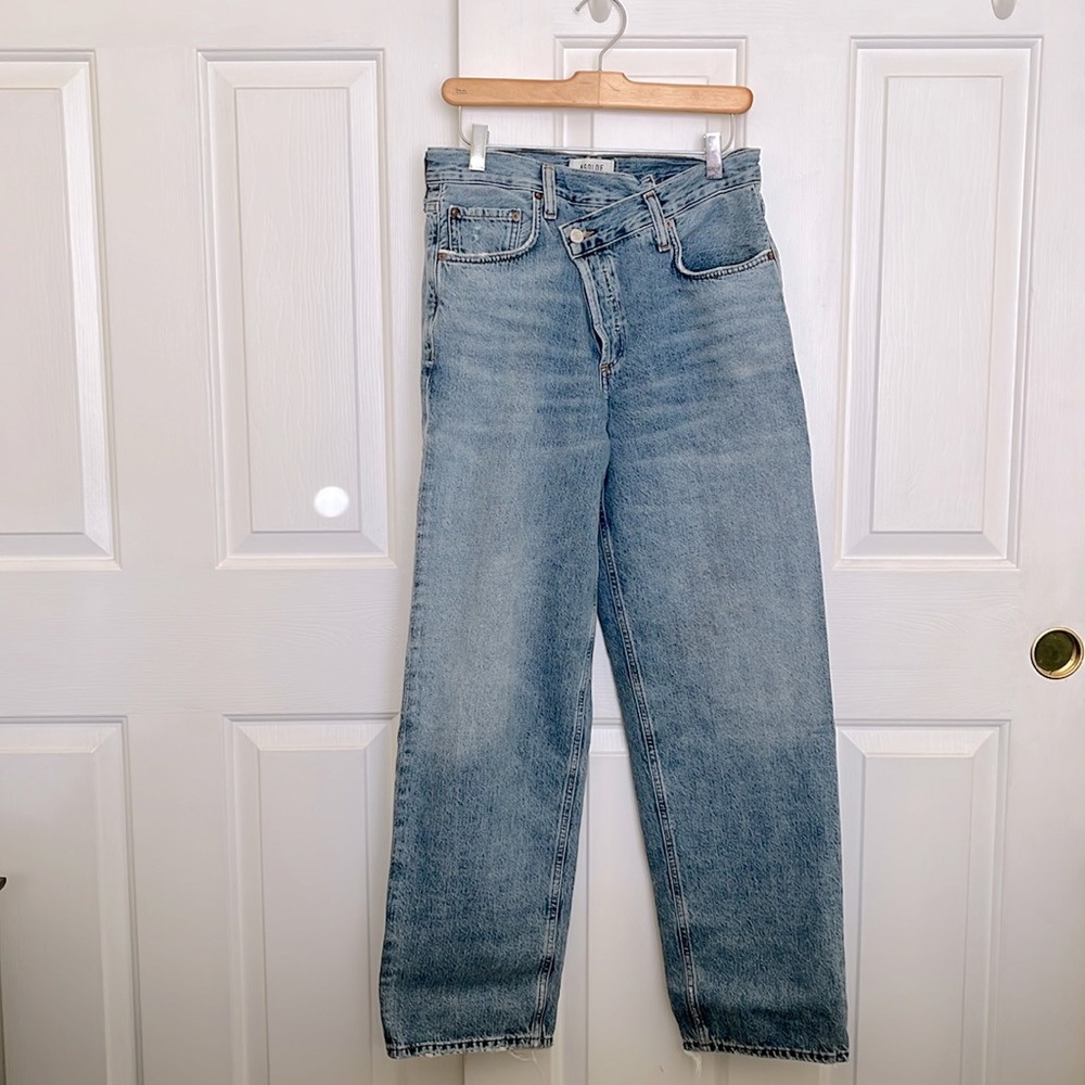 Agolde criss cross denim in washed blue. Size 27.